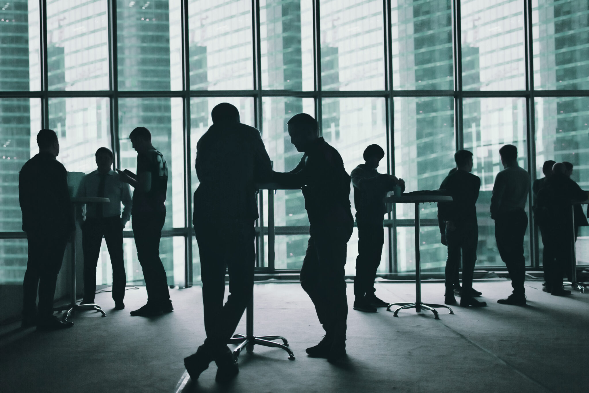 silhouetted professionals gather at meeting overlo 2026 03 13 01 47 57 utc scaled