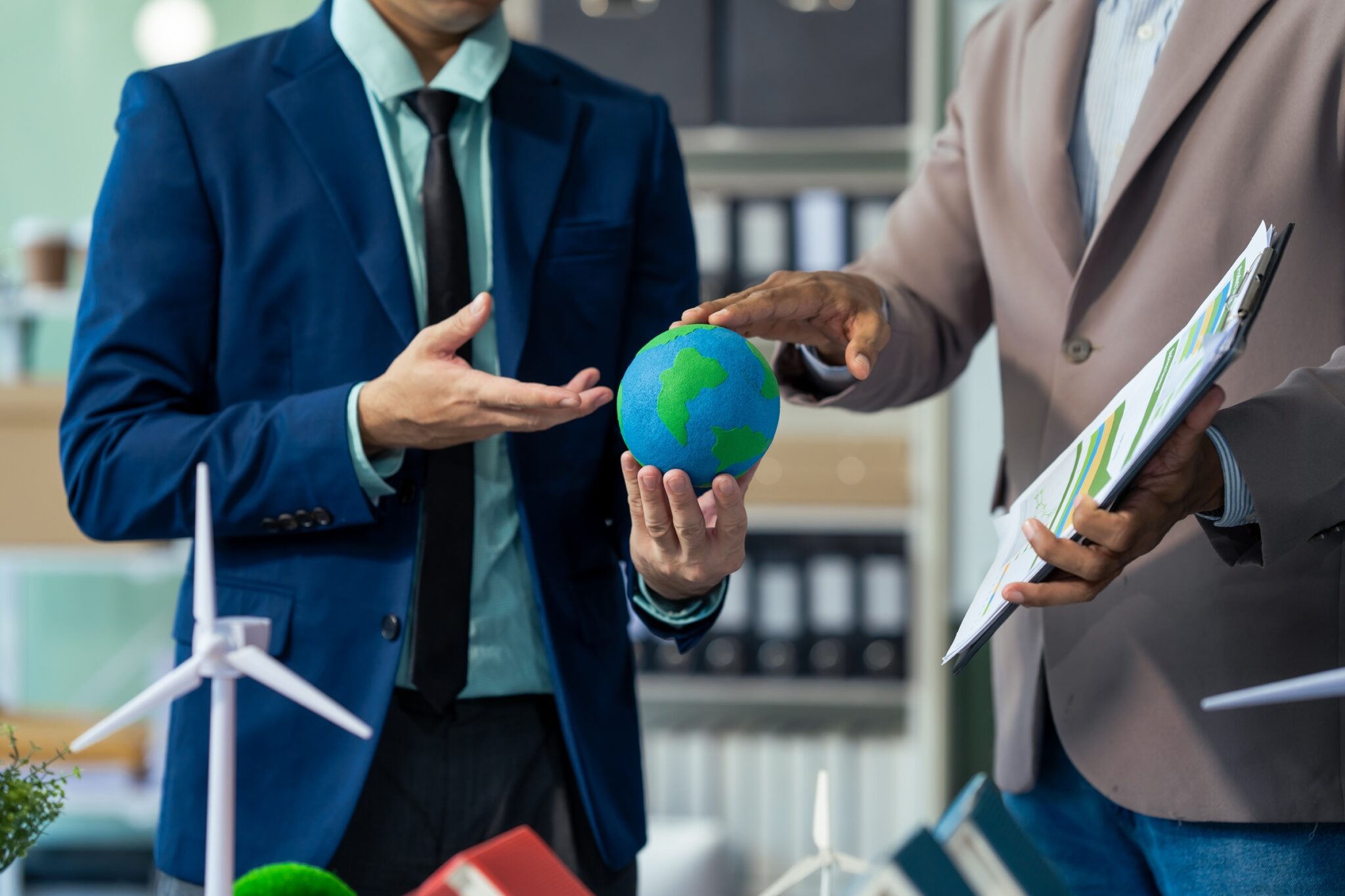 two asian businessmen in formal suits discuss idea 2026 01 08 07 51 30 utc scaled